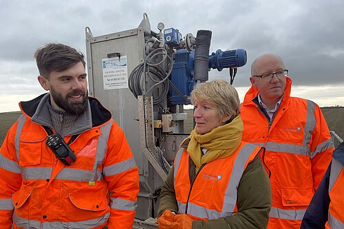 Pippa Heylings being shown Sewage Treatment Works by Louis Harvey, Treatment Manger, and Robin Price, Director of Environment and Water Quality, both from Anglian Water