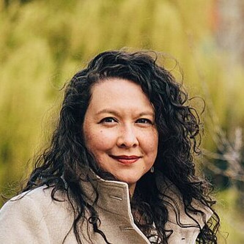 Victoria Collins in front of some trees