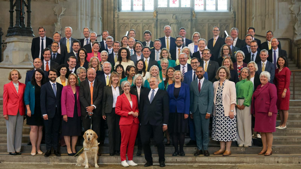 Group photo of 72 Lib Dem MPs lined up in Westminster Hall